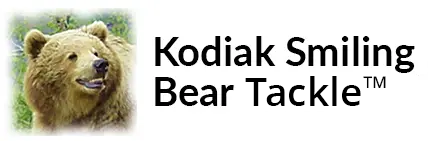 A bear that is sitting in front of the words kodiak state bear tag.