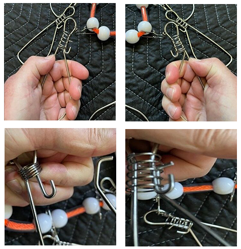 A person holding onto some fishing hooks